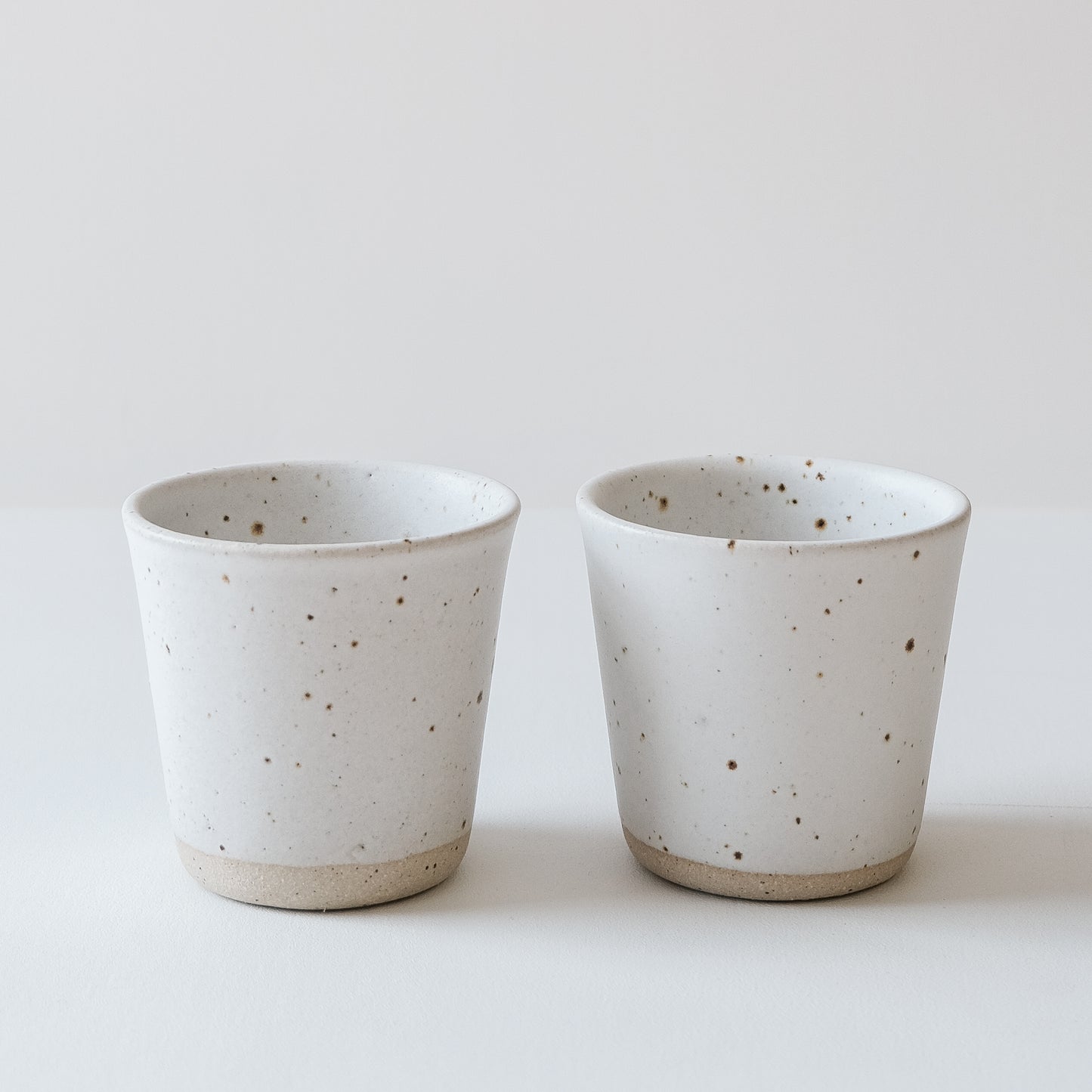 Matte White & Speckled Beakers - Set of 2 SECONDS - DOR & TAN